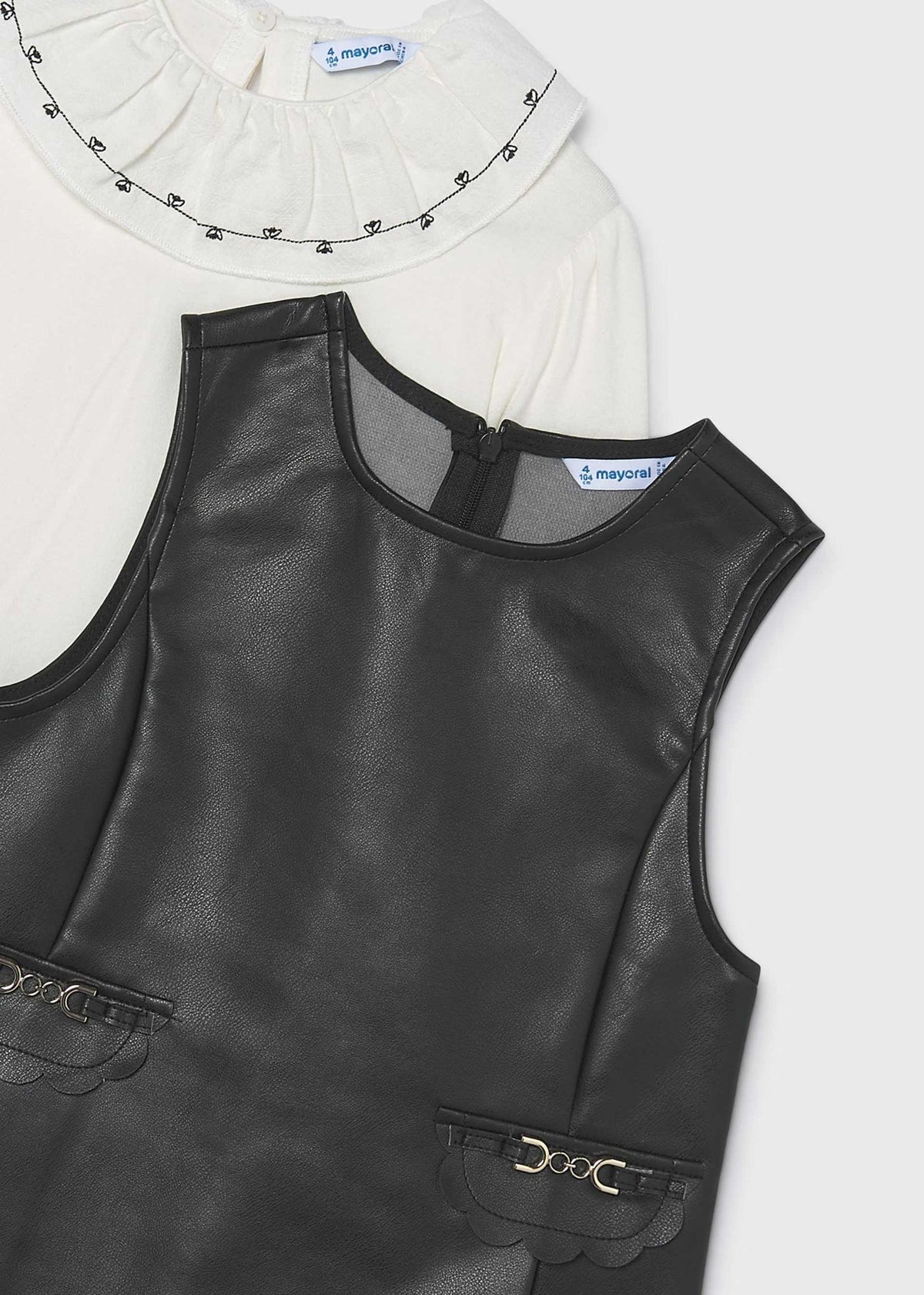Faux leather dress with a girl's blouse