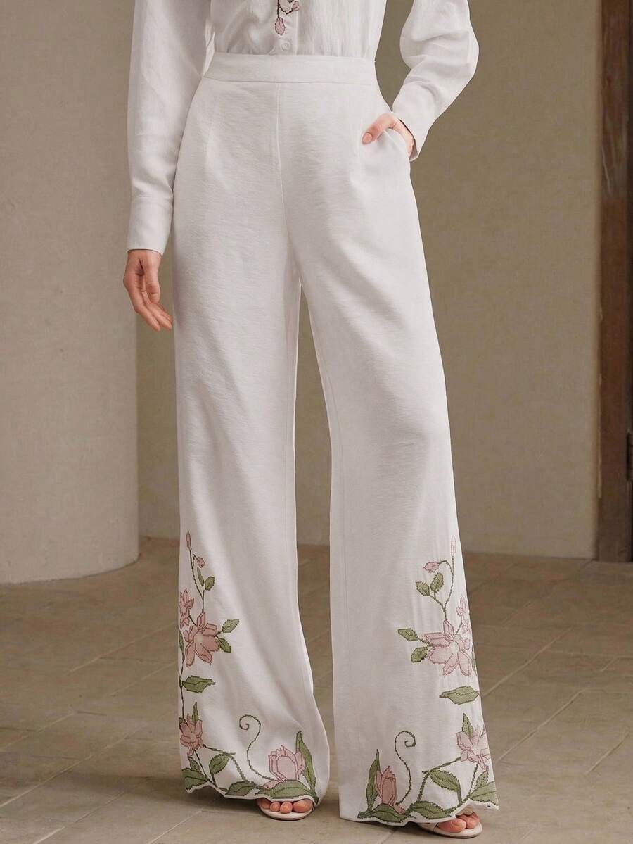 Elegante, locker sitzende Damenhose in Weiß