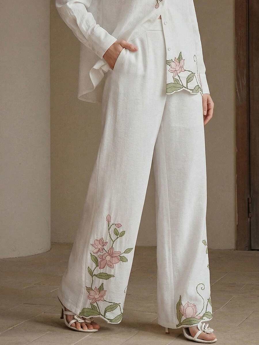 Elegante, locker sitzende Damenhose in Weiß