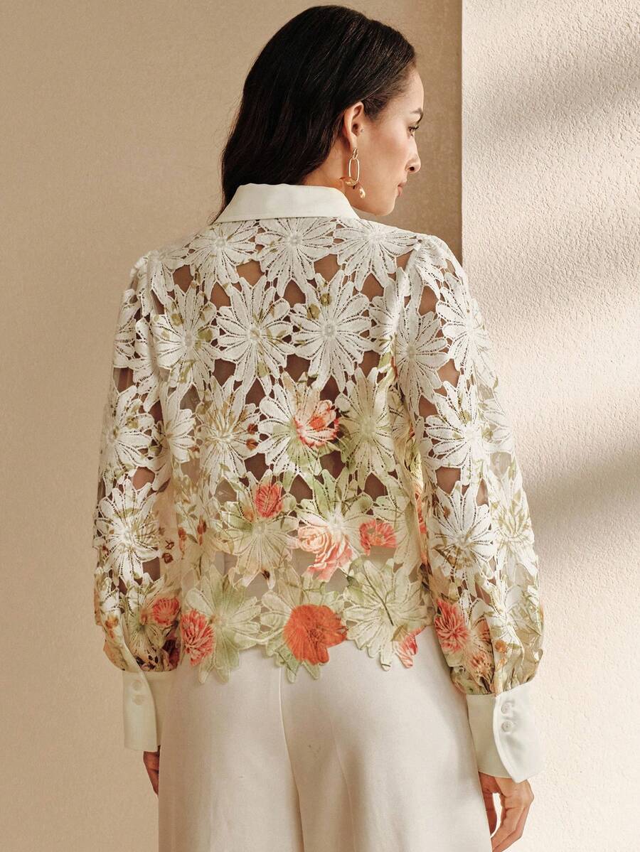 Leichte, luxuriöse und vielseitige Damenbluse mit Lochmuster und Druckmotiv