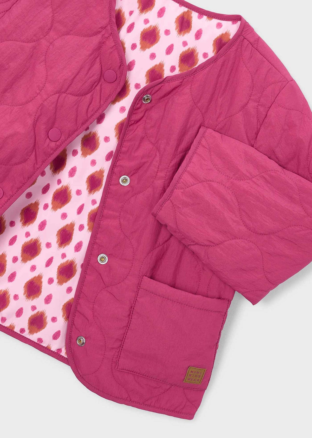 Reversible quilted jacket for girls